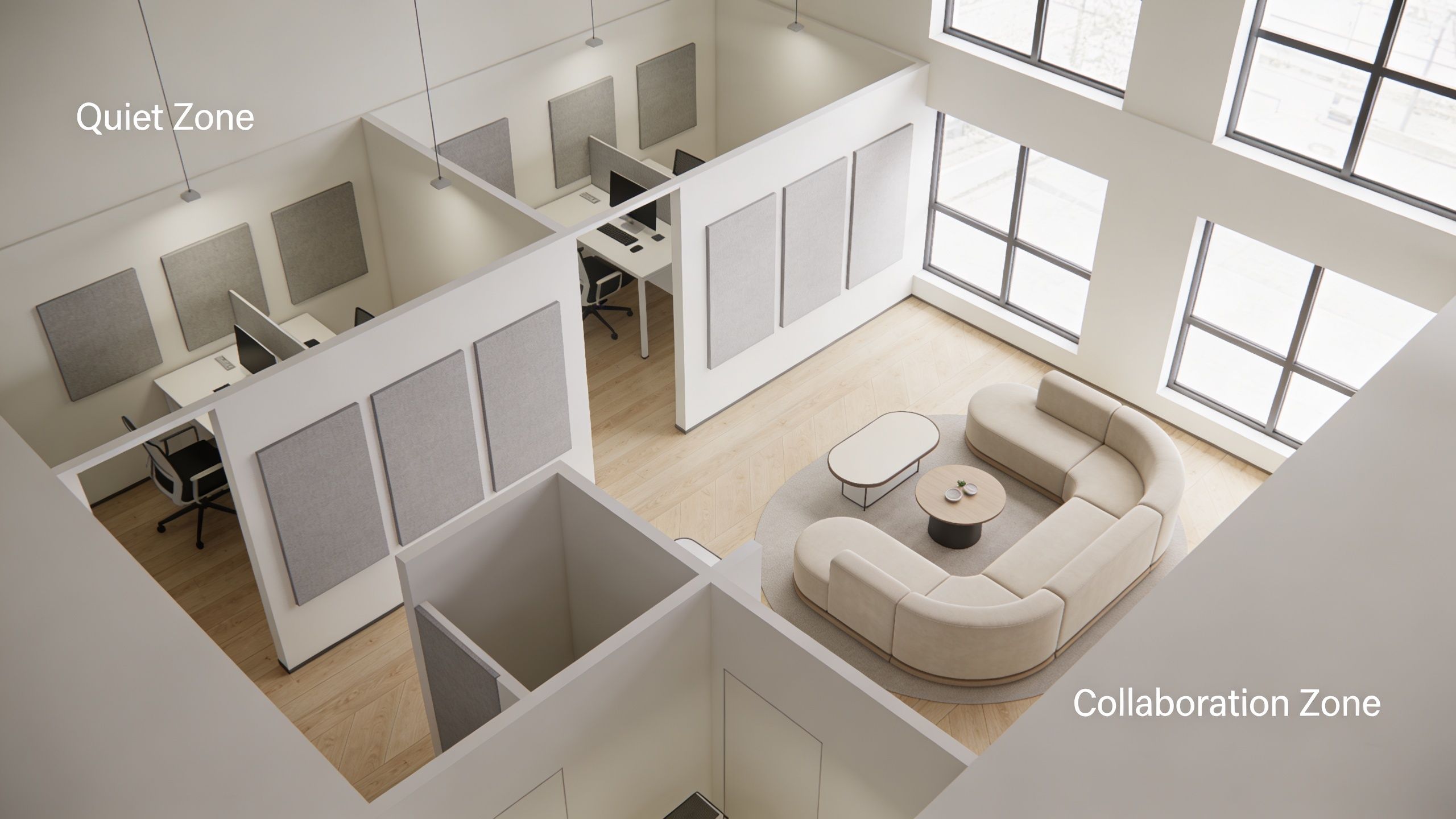 A modern open-plan office featuring a quiet workspace with individual desks and a comfortable collaboration lounge area.