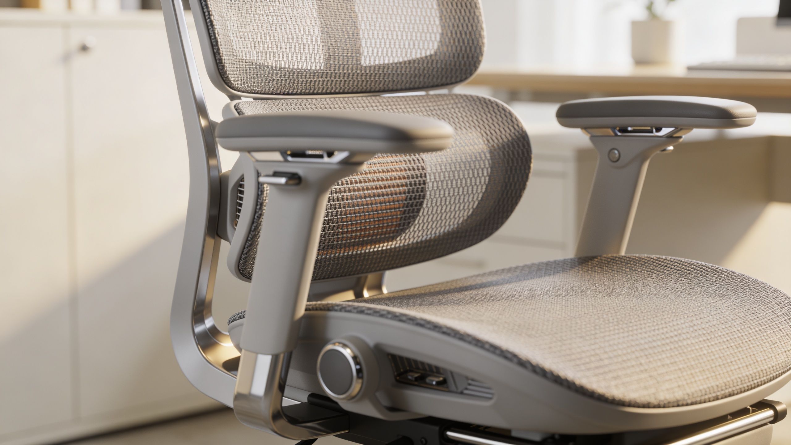 Close-up of a modern, ergonomic office chair with breathable mesh back and adjustable padded armrests